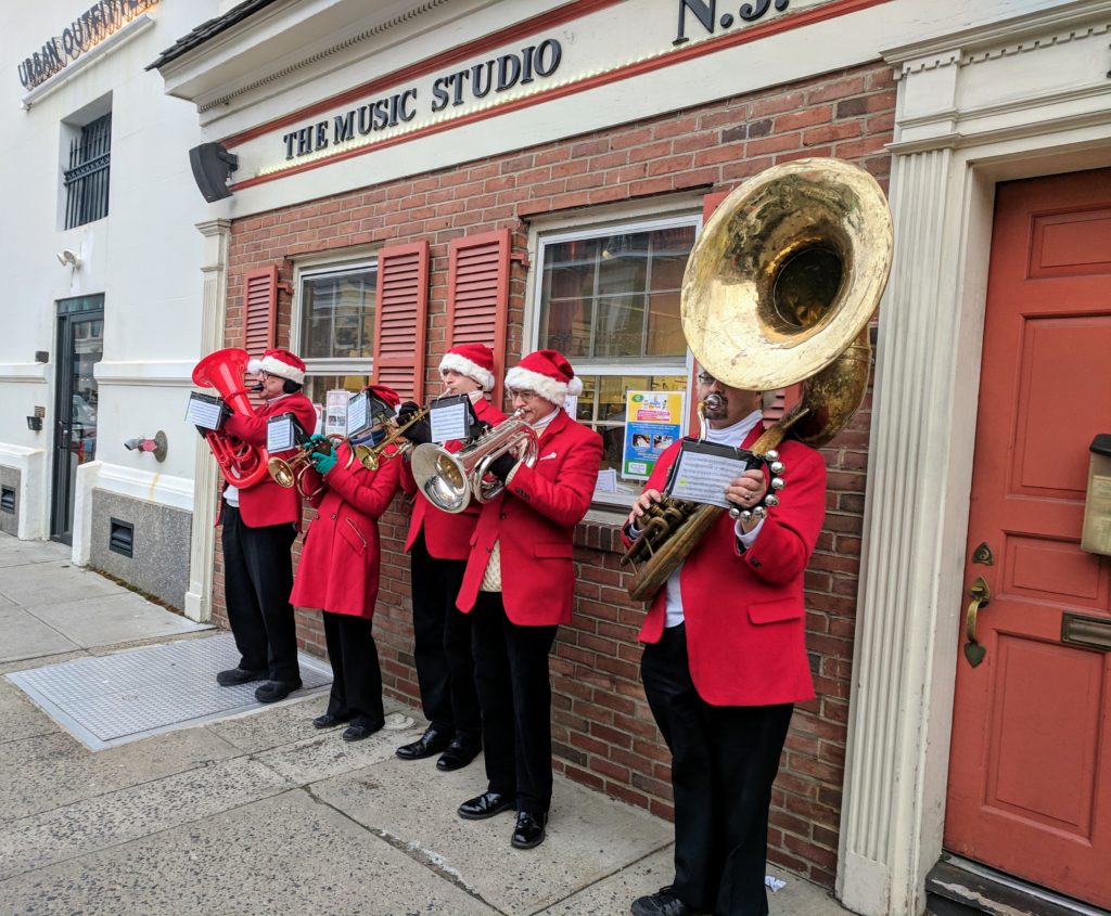 The NJWA brass quintet playing at a community event