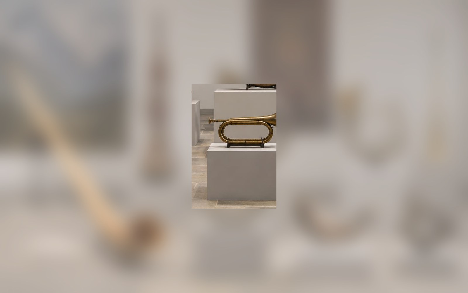 A brass bugle on display
