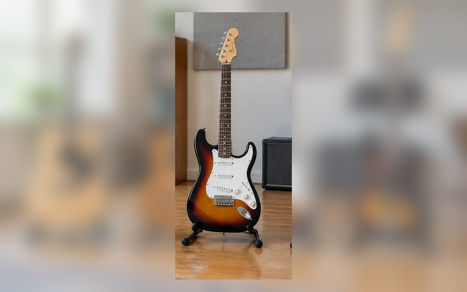 An electric guitar and amplifier in a music school studio